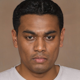 Neutral black young-adult male with short  black hair and brown eyes