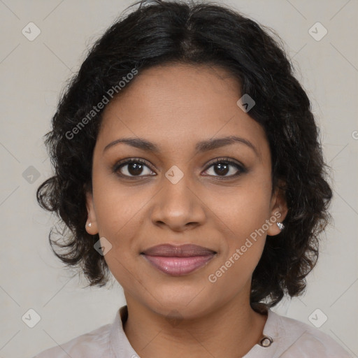 Joyful black young-adult female with medium  brown hair and brown eyes