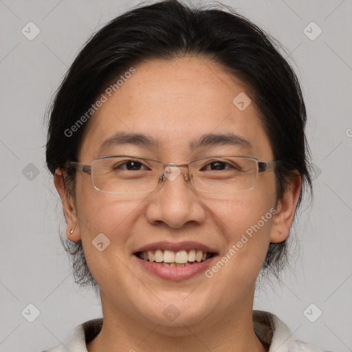 Joyful white adult female with medium  brown hair and brown eyes