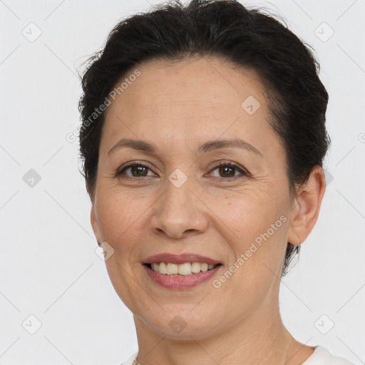 Joyful white adult female with short  brown hair and brown eyes