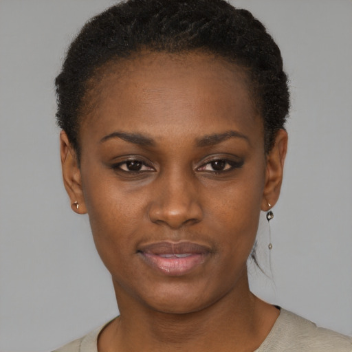 Neutral black young-adult female with short  black hair and brown eyes