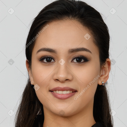 Joyful white young-adult female with long  brown hair and brown eyes