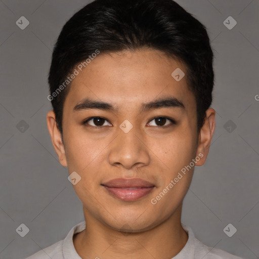 Joyful asian young-adult male with short  brown hair and brown eyes