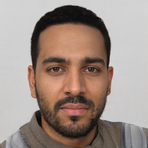 Neutral latino young-adult male with short  black hair and brown eyes