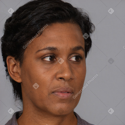 Neutral black young-adult female with short  brown hair and brown eyes