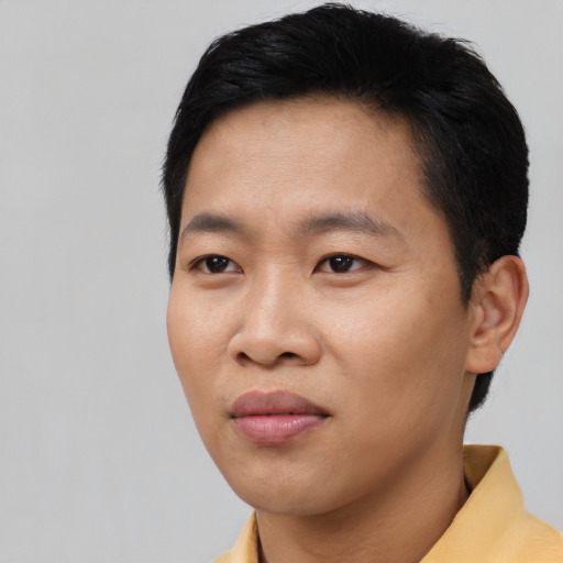 Neutral asian young-adult male with short  black hair and brown eyes