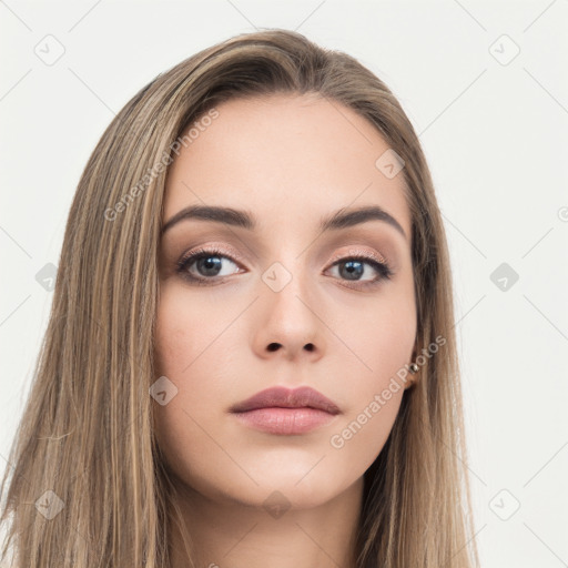 Neutral white young-adult female with long  brown hair and brown eyes