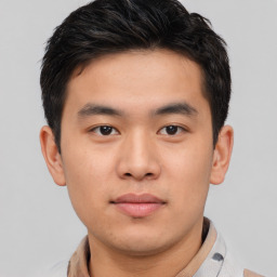 Neutral asian young-adult male with short  brown hair and brown eyes