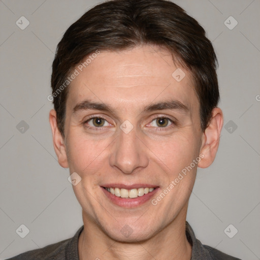 Joyful white adult male with short  brown hair and brown eyes