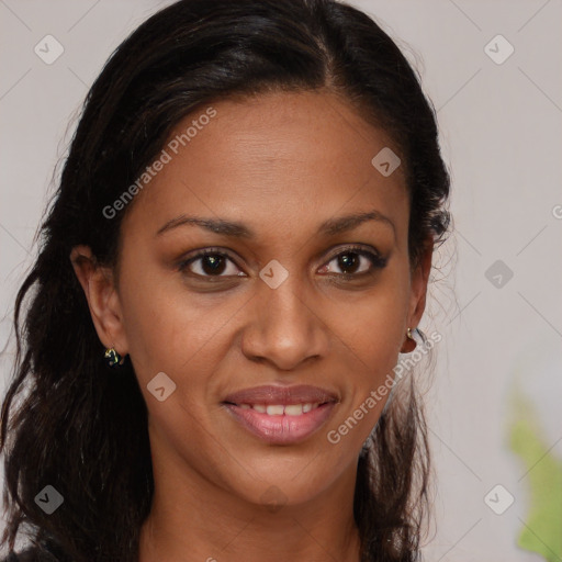 Joyful black young-adult female with long  brown hair and brown eyes