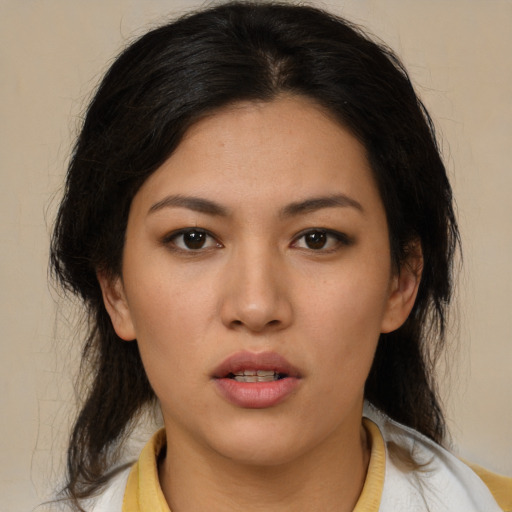 Neutral latino young-adult female with medium  brown hair and brown eyes