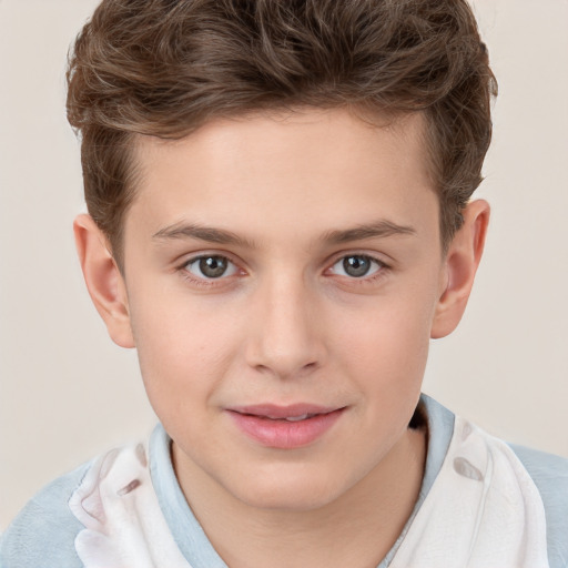 Joyful white child male with short  brown hair and brown eyes