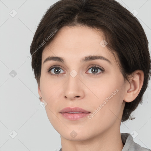 Neutral white young-adult female with short  brown hair and brown eyes