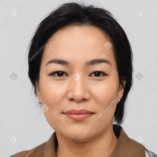 Joyful asian young-adult female with medium  black hair and brown eyes