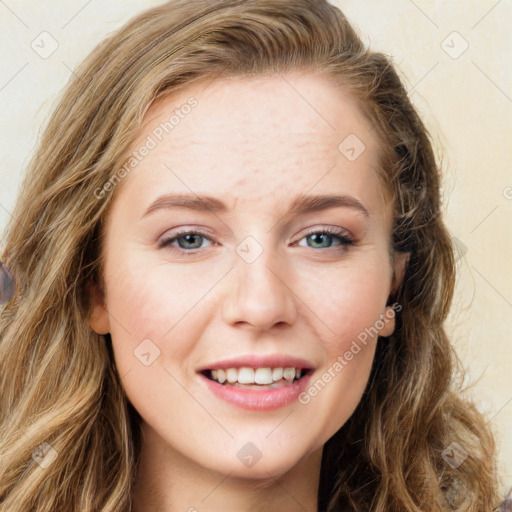 Joyful white young-adult female with long  brown hair and green eyes