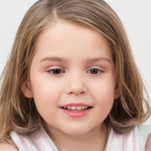 Joyful white child female with medium  brown hair and brown eyes