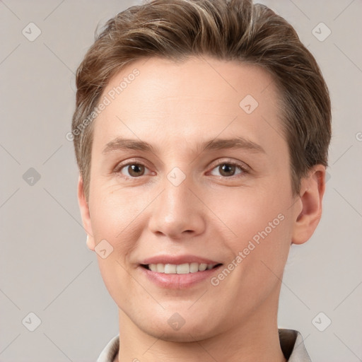 Joyful white young-adult female with short  brown hair and grey eyes