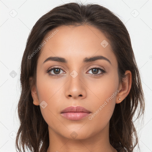 Neutral white young-adult female with long  brown hair and brown eyes