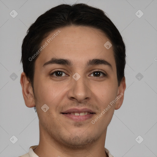 Joyful white young-adult male with short  brown hair and brown eyes