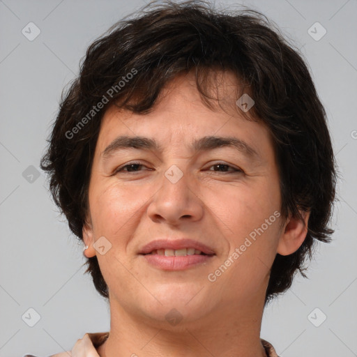 Joyful white adult female with medium  brown hair and brown eyes