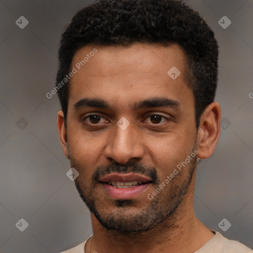 Joyful black young-adult male with short  black hair and brown eyes