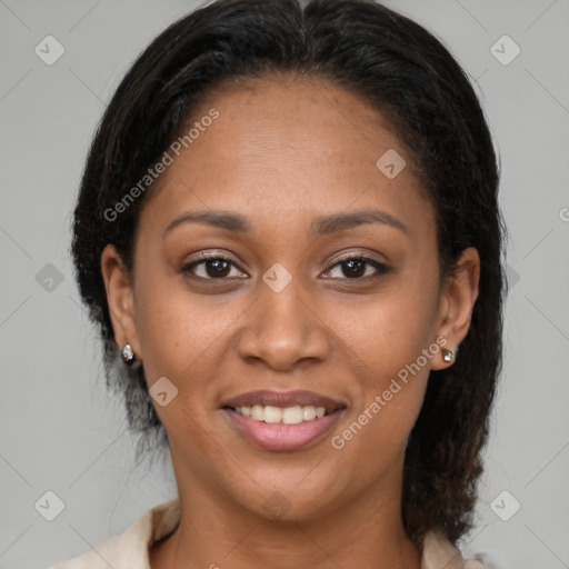 Joyful latino young-adult female with medium  brown hair and brown eyes