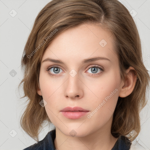 Neutral white young-adult female with medium  brown hair and blue eyes