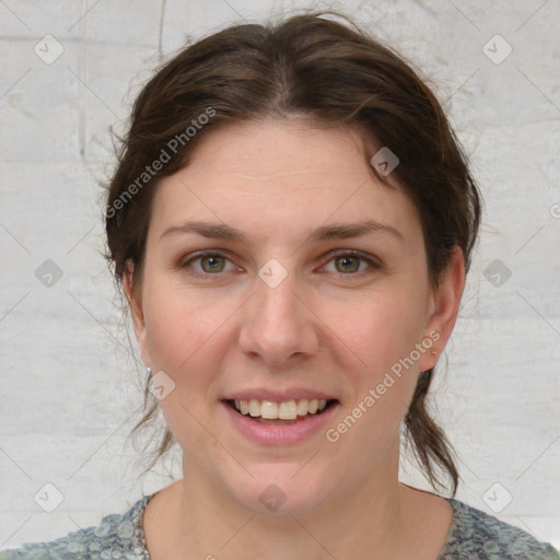 Joyful white young-adult female with medium  brown hair and blue eyes