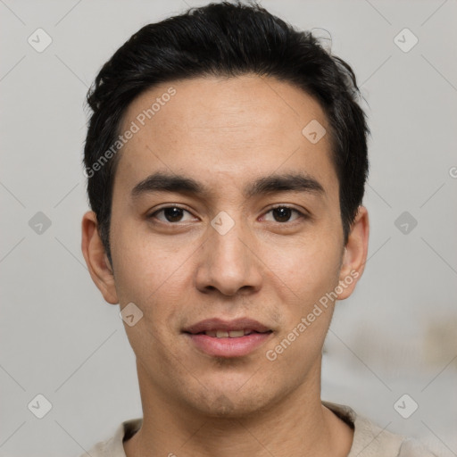 Joyful white young-adult male with short  black hair and brown eyes