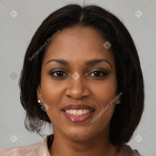 Joyful black young-adult female with medium  brown hair and brown eyes