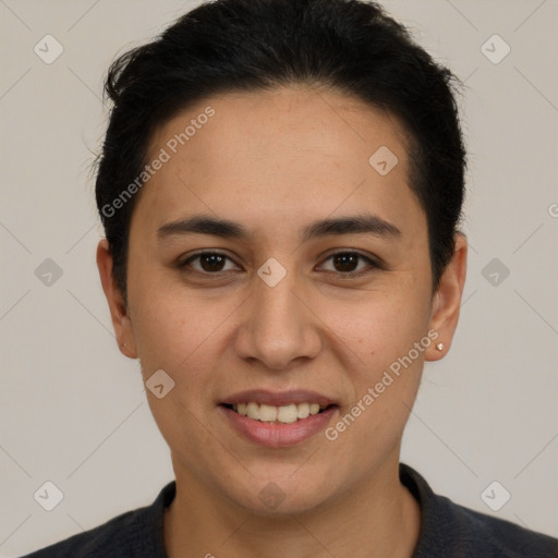 Joyful white young-adult female with short  brown hair and brown eyes