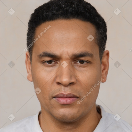 Neutral latino young-adult male with short  black hair and brown eyes