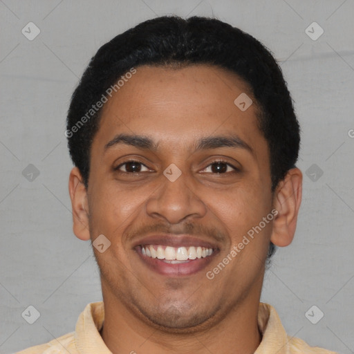 Joyful latino young-adult male with short  black hair and brown eyes