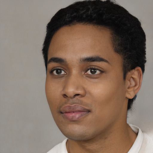 Neutral black young-adult male with short  black hair and brown eyes