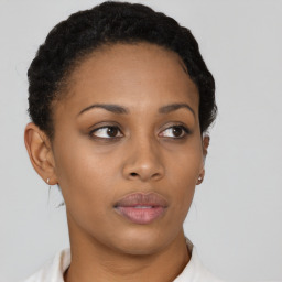 Neutral black young-adult female with short  brown hair and brown eyes