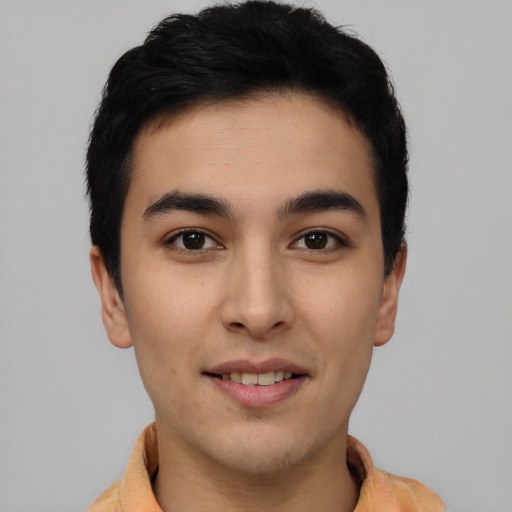 Joyful asian young-adult male with short  black hair and brown eyes