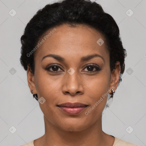 Joyful latino young-adult female with short  black hair and brown eyes