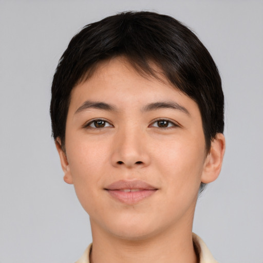 Joyful asian young-adult female with short  brown hair and brown eyes