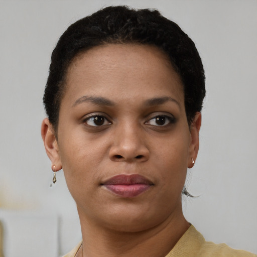 Neutral black young-adult female with short  brown hair and brown eyes