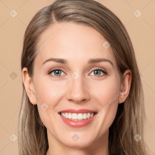 Joyful white young-adult female with long  brown hair and grey eyes