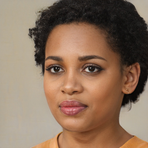 Neutral black young-adult female with medium  black hair and brown eyes