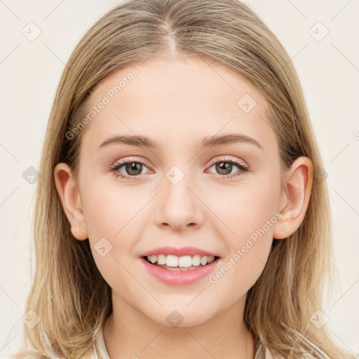 Joyful white young-adult female with long  brown hair and blue eyes