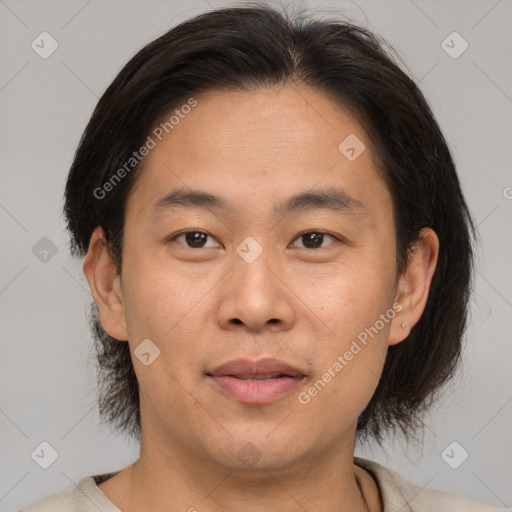 Neutral asian young-adult male with short  brown hair and brown eyes