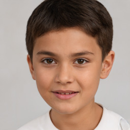 Joyful white child male with short  brown hair and brown eyes