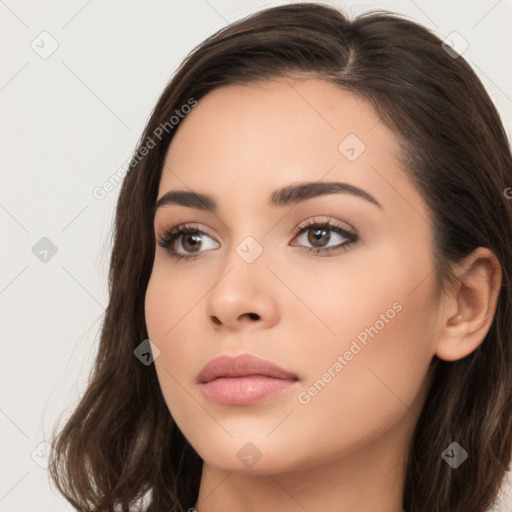 Neutral white young-adult female with long  brown hair and brown eyes