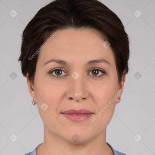 Joyful white adult female with short  brown hair and brown eyes