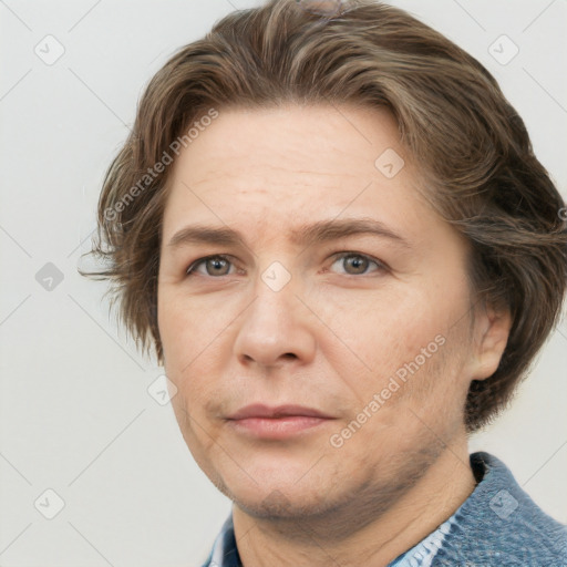 Joyful white adult male with short  brown hair and grey eyes