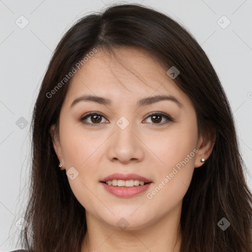 Joyful white young-adult female with long  brown hair and brown eyes