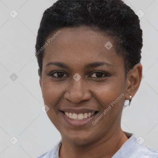 Joyful black young-adult female with short  brown hair and brown eyes