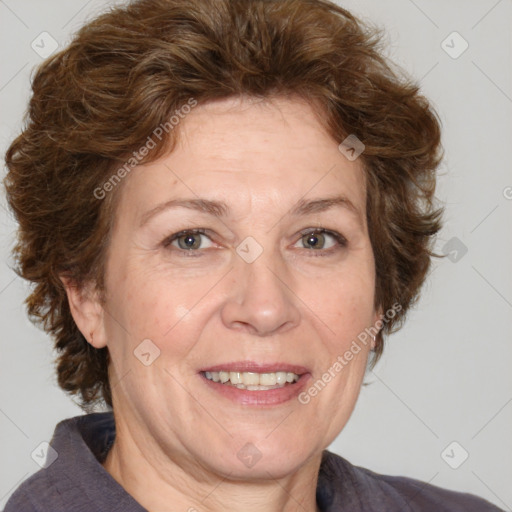 Joyful white adult female with medium  brown hair and blue eyes